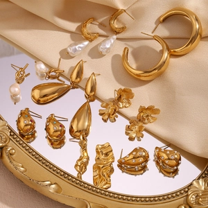 Detailed collection of 18K gold plated drop earrings with pearls and zircon accents