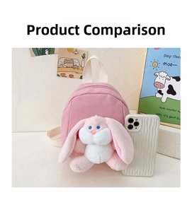 Pink children's canvas backpack with plush long-eared bunny and phone for scale