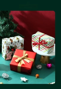 Detailed view of assorted Christmas gift boxes with festive nutcracker patterns and ribbons