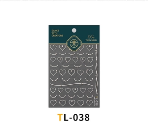Détail des stickers d'ongles 5D cœurs en perles blanches sur emballage TL-038