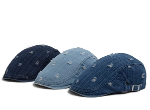 Detailed view of distressed denim ivy caps with striped texture and metal side buckles
