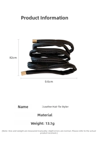 Detailed view of the 82cm black leather hair tie bun maker with golden metal end caps