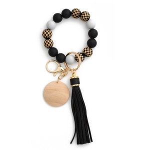 Silicone bead keychain bracelet with checkered beads, black tassel and wooden disc