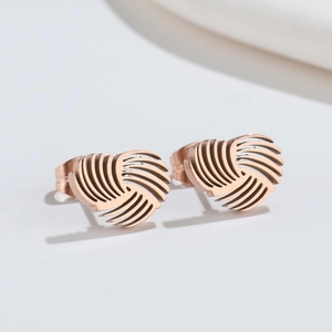 Elegant rose gold hollow heart stud earrings in minimalist stainless steel geometric style