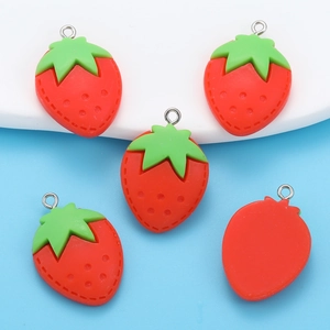 Five red resin strawberry charms with green leaves and metal rings for DIY jewelry making