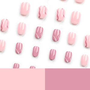 Short square press-on nails in light pink and marble rose finish on white background