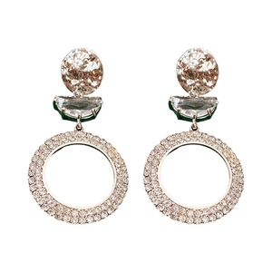 Golden circle and moon earrings with clear cubic zirconia pavé on a white background