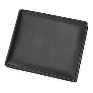 Close-up of premium black genuine leather texture and precision stitching on the tri-fold wallet