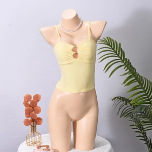 Detail view of light yellow ribbed knit camisole with front ruching and metal buckle