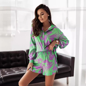 Women's two-piece purple and green floral satin shirt and shorts vacation set