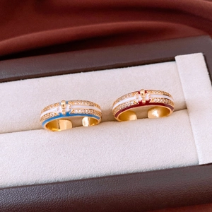 Detail of 18k gold plated open rings with colorful enamel and zircon micro-paving