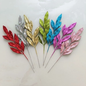 Set of seven glittery Christmas artificial leaf branches in assorted festive colors