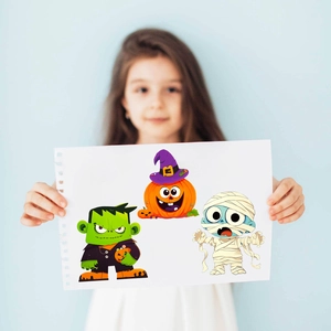 Kids holding Halloween monster stickers featuring pumpkin, mummy, and Frankenstein themes