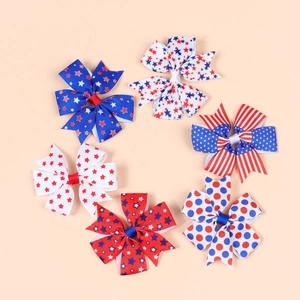 Detailed view of six double-layered US flag bows with stars and stripes patterns