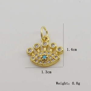 Close-up of gold Evil Eye charm with blue zircon, size 1.4cm by 1.3cm, weight 0.8g