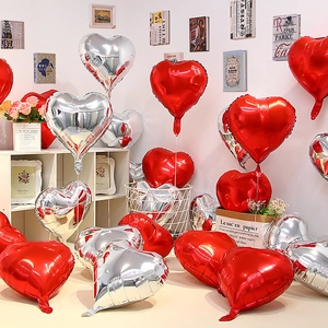 Romantic heart-shaped aluminum foil balloons in red and silver for party decorations