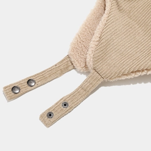 Beige corduroy trapper hat with warm faux shearling lining and metal snap buttons