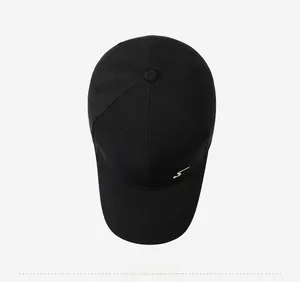 Top view of a black baseball cap featuring a distinctive gold wave embroidery logo on the side
