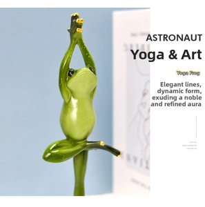 Detail of green yoga frog figurine with glossy finish in a meditative one-leg balance pose