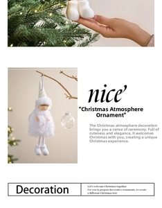 Close-up of plush white Christmas angel ornaments with sequins on a decorated tree