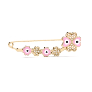 Close-up of 18K gold plated evil eye brooch with pink enamel and sparkling zircons