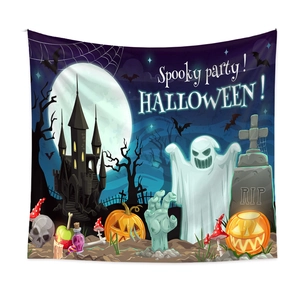 Detail of Halloween tapestry featuring spooky castle, jack-o'-lanterns and ghosts