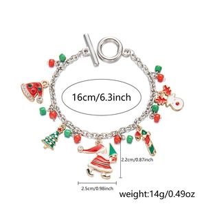 Detail view of Christmas charm bracelet with Santa and tree pendants with size labels