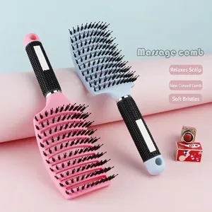 Pink and blue curved boar bristle hairbrushes for detangling and scalp massage