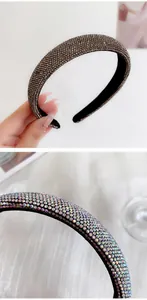 Macro detail of padded headband with champagne and AB rhinestones on soft velvet