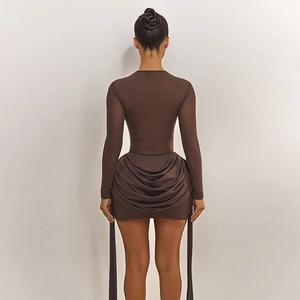 Close-up of ruched detail on a coffee brown bodycon dress showing fabric texture