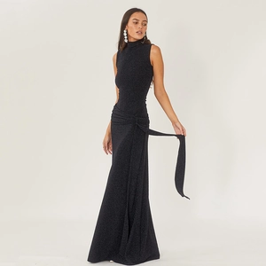 Close-up of elegant black sleeveless sequin maxi dress with waist tie and slim fit design