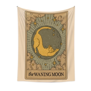 Bohemian tarot style tapestry featuring a ginger cat on the moon with stars and clouds