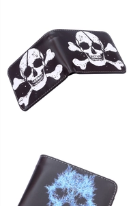 Detail of bi-fold men's wallets showing skull prints and contrast stitching on leather