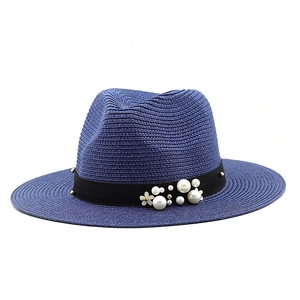 Navy blue wide brim straw sun hat for women with pearl band and floral charm accent