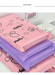 Detail of pink and purple cartoon bear shipping bags with cute Hello text pattern