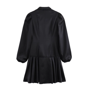 Elegant black satin V-neck mini dress with pleated hem and long sleeves, rear view