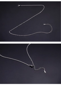 Detail view of S925 sterling silver cross chain with spring clasp and extension chain