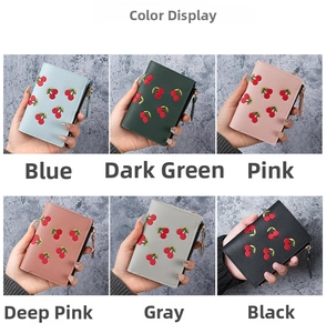 Detail of short wallets featuring cherry embroidery and pebble leather in six colors