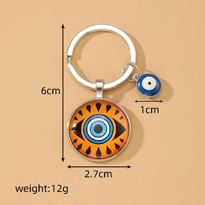 Orange and blue Evil Eye keychain pendant with glass charms and dimension markings