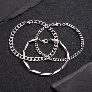 Three-piece silver stainless steel hip hop Cuban and link bracelet set for men on shale