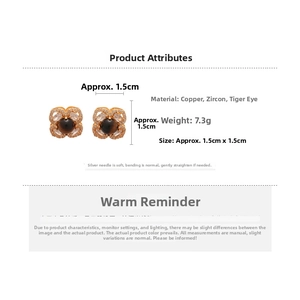 Detailed view of 18k gold plated flower stud earrings with tiger eye stone and zircon crystals