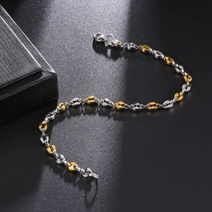 Detailed close-up of 4.5mm coffee bean chain bracelet with gold and silver links