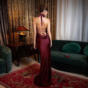 Elegant backless burgundy satin halter maxi dress with criss-cross tie detailing