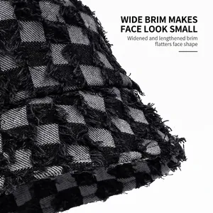 Checkered knit bucket hat with raw edges and wide brim for winter fashion