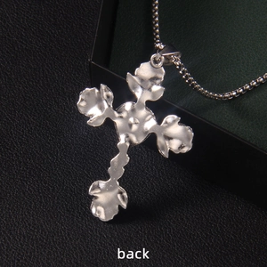 Silver cross necklace with unique lava texture on the back and circular chain links