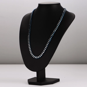 Sleek blue and silver curb chain necklace displayed on a black neck model mannequin