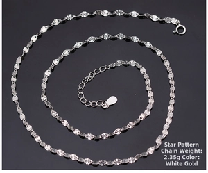 Macro detail of S925 silver rice pattern carved chain with adjustable spring clasp