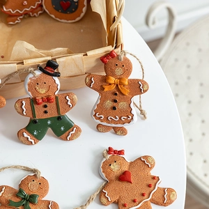 Handcrafted gingerbread man resin ornaments with rustic twine for Christmas tree decoration