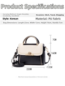 Detailed view of the black and white PU leather handbag with size dimensions and charms