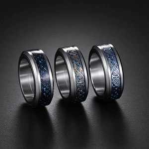 Bagues rotatives pour hommes en acier titane avec motifs de dragon celte bleu et or